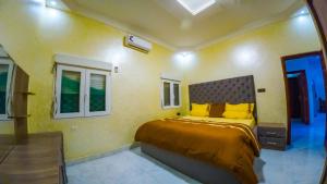 Postel nebo postele na pokoji v ubytování Appartements hôteliers Hayat