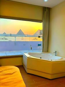 Ảnh trong thư viện ảnh của PYRAMiDS GOLDEN EYE HOTEL ở Cairo