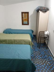 Postel nebo postele na pokoji v ubytování Hermosa Casa equipada a metros del Río Cosquín + 13 fotografií