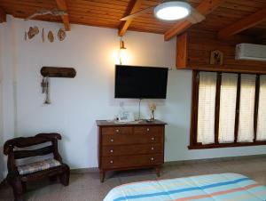 Et tv og/eller underholdning på Oasis Cochera opcional