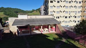 an overhead view of a house with a building at Terraço do Sol Apt 03 in Marcelino Ramos