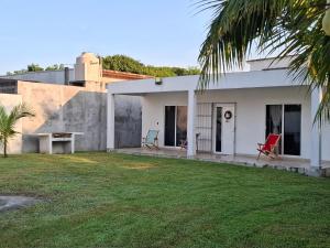 Fotografie z fotogalerie ubytování Casa de Playa Elsa v destinaci La Vigueta + 13 fotografií