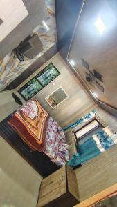 een slaapkamer met een bed bij Kparth cottage in Jāmb