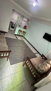 TV/trung tâm giải trí tại Casa aconchegante na beira de canal