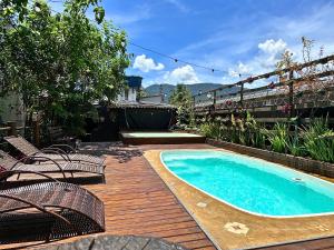 Swimmingpoolen hos eller tæt på Pousada Caragua Poesia na Praia