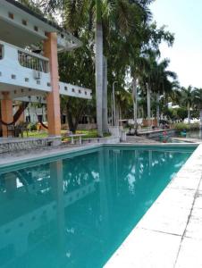 Bazén v ubytování Villas Náutico Chairel nebo v jeho okolí + 17 fotografií