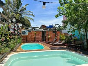 Swimmingpoolen hos eller tæt på Pousada Caragua Poesia na Praia