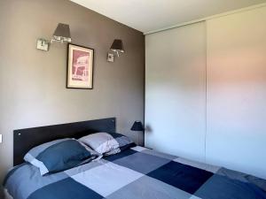 En eller flere senge i et værelse på Appartement lumineux à Messanges - 4 pers, animaux admis, parking - FR-1-857-62 + 9 billeder