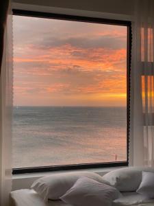 Postel nebo postele na pokoji v ubytování Aloha Homestay - Đảo Phú Quý