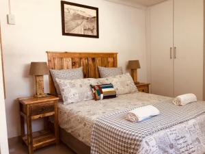 Ένα ή περισσότερα κρεβάτια σε δωμάτιο στο MELJAA GROUP Guesthouse +1 φωτογραφίες