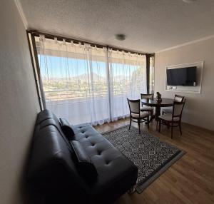 TV a/nebo společenská místnost v ubytování Departamento A pasos de casino Antay