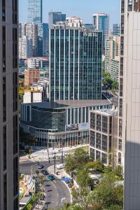 Nespecifikovaný výhled na destinaci Šanghaj nebo výhled na město při pohledu z hotelu