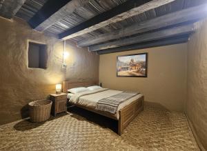 Postel nebo postele na pokoji v ubytování Chaukhamba Cradle