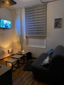 Posezení v ubytování Mon cocooning au pied de la plage T3 couchages