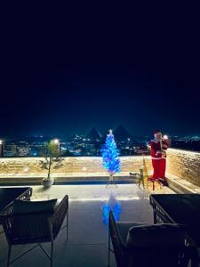 Balkón nebo terasa v ubytování Stork Pyramids Grand Museum