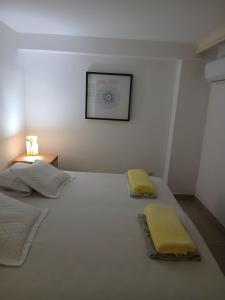 En eller flere senge i et værelse på Hostel Lapa 166