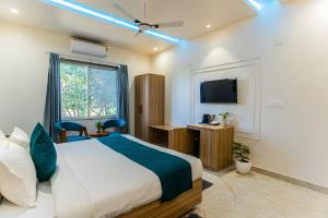 Et tv og/eller underholdning på The Oasis Retreat