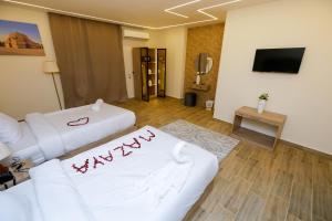 TV a/nebo společenská místnost v ubytování Mazaya Pyramids view inn