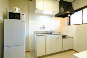 Kuchyň nebo kuchyňský kout v ubytování F-City 中葛西 I + 44 fotografií