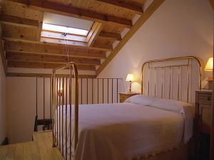 Postel nebo postele na pokoji v ubytování Posada Molino del Canto