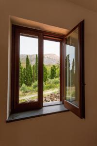 a view through a window of a house at Casa Schmidt in Vulcano
