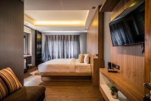 TV tai viihdekeskus majoituspaikassa Le Terrarium Bed & Sleep Chiang Rai