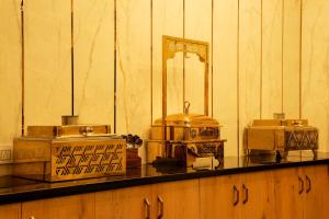 a counter with many different items on it at NTS Nirvana Suites in Bangalore