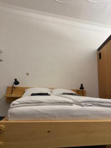 Postel nebo postele na pokoji v ubytování Apartments Lichtenstein