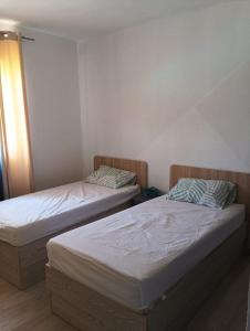 Ένα ή περισσότερα κρεβάτια σε δωμάτιο στο Y Holidays, for a fun relaxing group getaway +15 φωτογραφίες