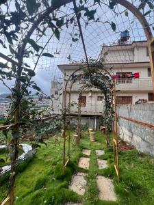 En have udenfor Essar Cottage