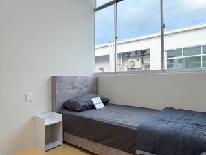 Postel nebo postele na pokoji v ubytování KB Penang Guest House-10pax Signature Cozy Kids Bertam Avenue + 50 fotografií