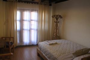 Krevet ili kreveti u jedinici u okviru objekta Lalit Heritage Home