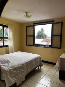 En eller flere senge i et værelse på Casa 27