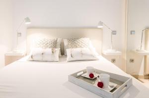Cama o camas de una habitación en Canal De Isabel II