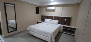 En eller flere senge i et værelse på Del Este 2