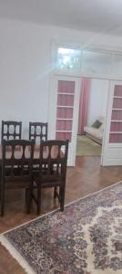 En eller flere senge i et værelse på Casa Roxana