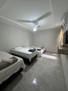 Postel nebo postele na pokoji v ubytování Pousada 10 de maio + 37 fotografií