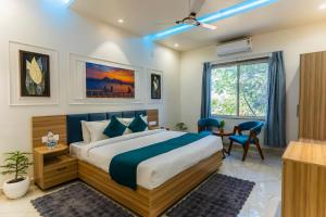 En eller flere senge i et værelse på The Oasis Retreat + 31 billeder