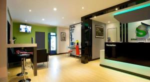 TV a/nebo společenská místnost v ubytování Siamgrand Hotel