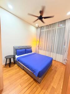 Ένα ή περισσότερα κρεβάτια σε δωμάτιο στο Vortex Suites KLCC By Comforthome +16 φωτογραφίες