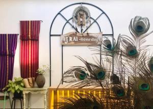 a room with a sign that reads real humanity at Jrai Homestay in Pleiku