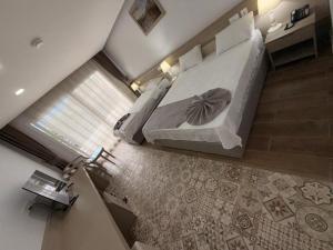 Giường trong phòng chung tại Altinkaya Holiday Resort +11 ảnh