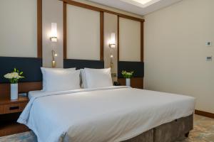 Postel nebo postele na pokoji v ubytování Ancyra Hotel - By Continent - فندق انكيرا + 49 fotografií