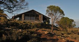 a small house sitting on top of a hill at Riverview Rise Retreats in Mannum