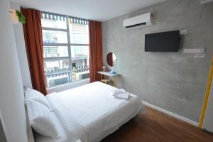 Postel nebo postele na pokoji v ubytování Vrest Hotel