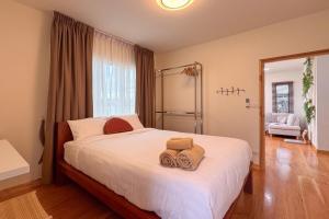 Giường trong phòng chung tại Water villa rayong