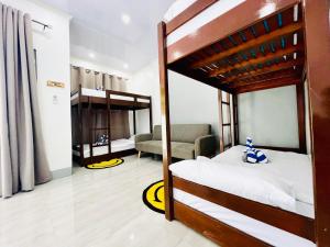 Giường trong phòng chung tại Olliz Huvila +27 ảnh