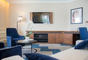 TV a/nebo společenská místnost v ubytování Boutique Hotel La Roche