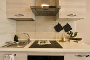 Nhà bếp/bếp nhỏ tại Domus Fabia Rooms & Apartments