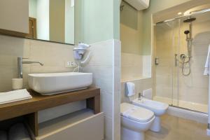 Phòng tắm tại Domus Fabia Rooms & Apartments